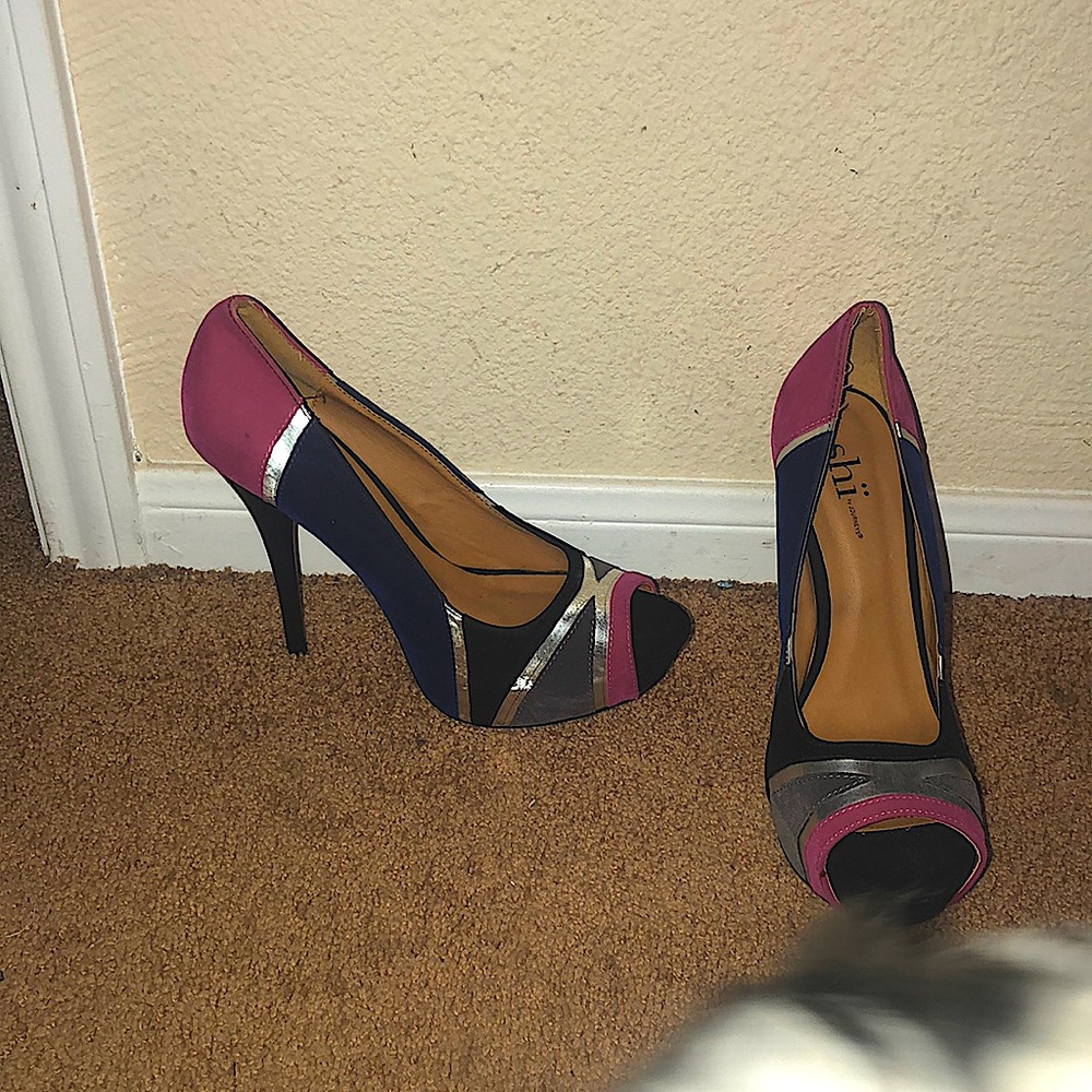 pair of beautiful color blocked peep toe heels
